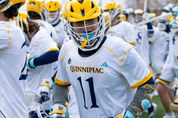 Quinnipiac Men's Lacrosse players in full gear.