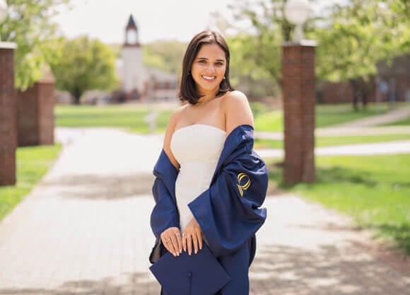 LoPresti poses with cap and gown