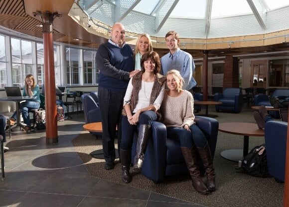 Group photo of the Massey family in the Carl Hansen Student Center