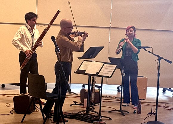 The Myriad Project performs together.